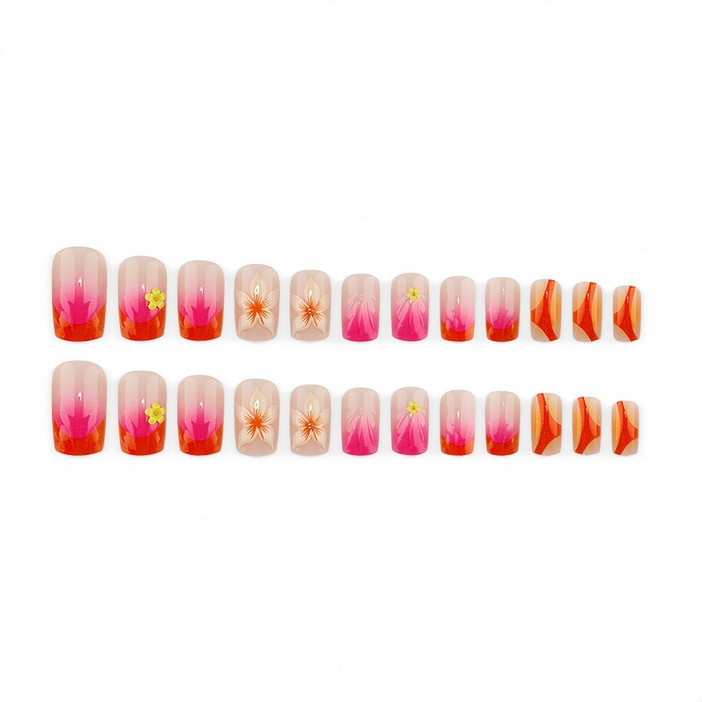 Kreatives Kunstnagelset mit floralen und Ombre-Designs Karnz