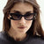 Damen Cat-Eye Sonnenbrille mit stilvollem Einsatz aus Metall und UV-Schutz Karnz