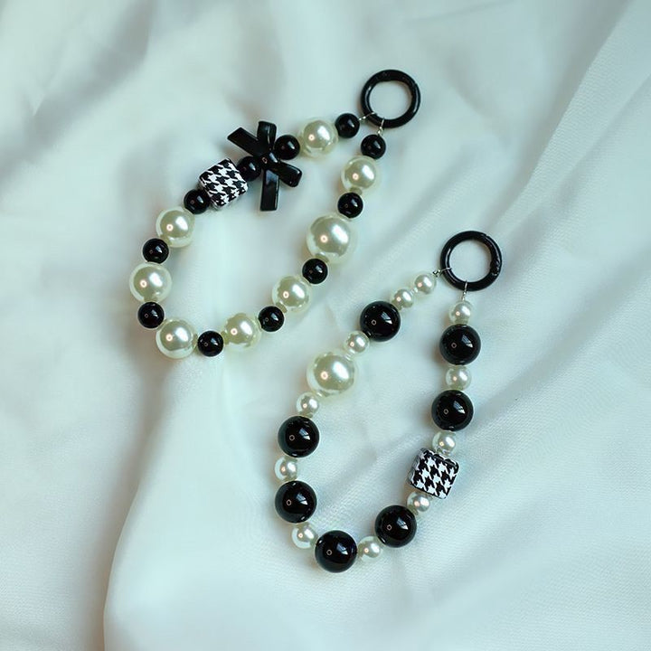 Elegante Perlen- und schwarze Perlen-Charm-Armband Karnz