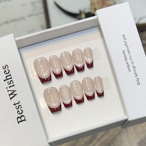 Künstlerisches Gel Press-On Nagelset mit eleganten französischen Spitzen Karnz