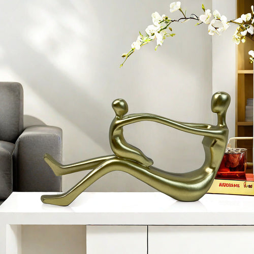 Stilvolle Skulptur mit ineinander verschlungenen Figuren Karnz