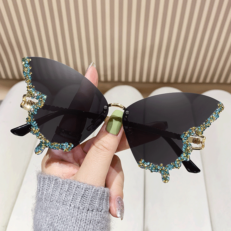 Damen extravagante Sonnenbrille mit funkelndem Butterfly-Design Karnz