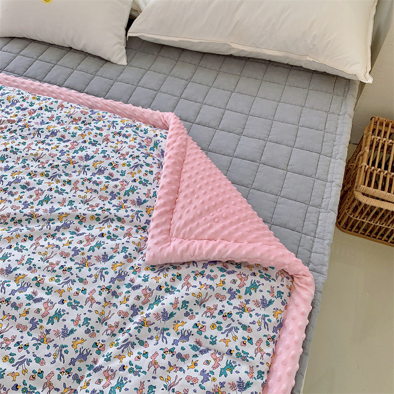 Kinder-Steppdecke mit buntem Dinosaurier-Print und weicher Minky-Borte
