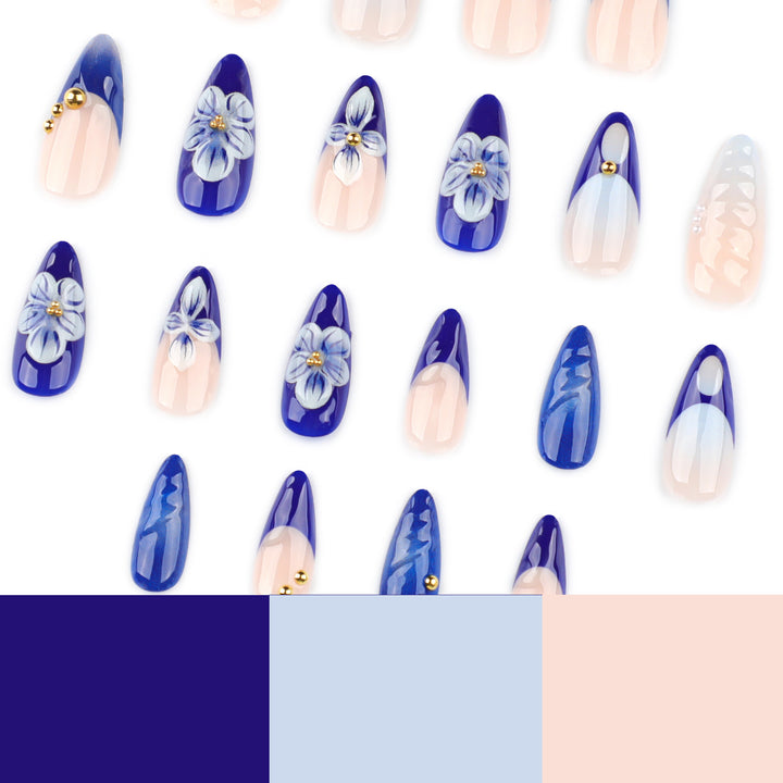 Kunstvolle Nailart mit floralen Akzenten und Glitzerverzierungen Karnz