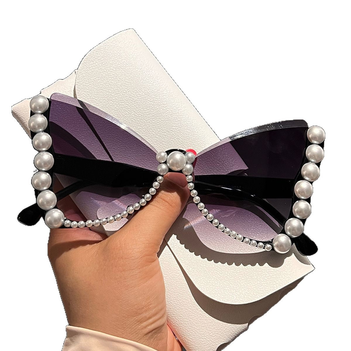 Damen auffällige Sonnenbrille mit Perlenverzierung Karnz