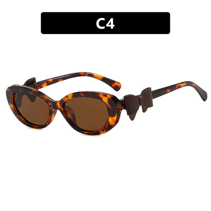 Damen modische Sonnenbrille mit verspieltem Schleifen-Design Karnz