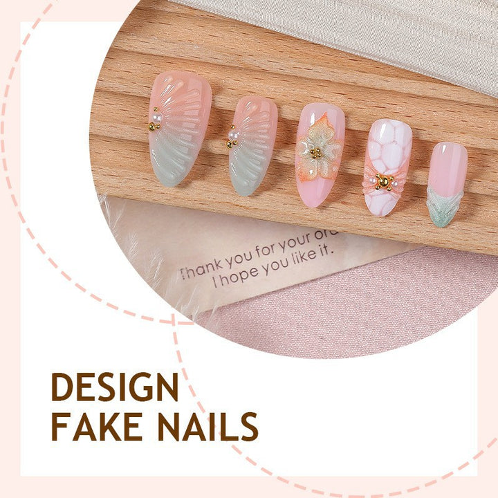 Kunstnagelset mit floralen und glamourösen Designs Karnz