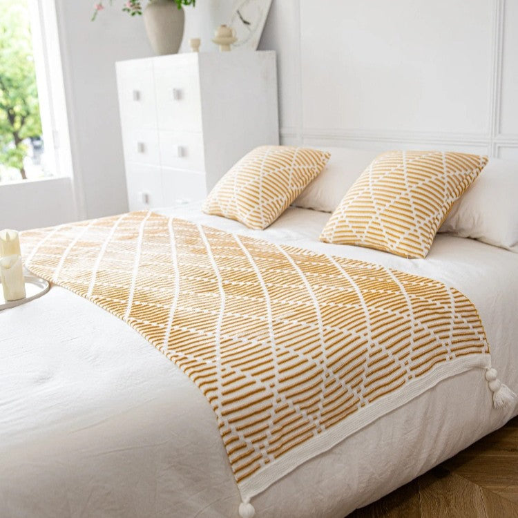 Dekorativer Strickwurfdecke
