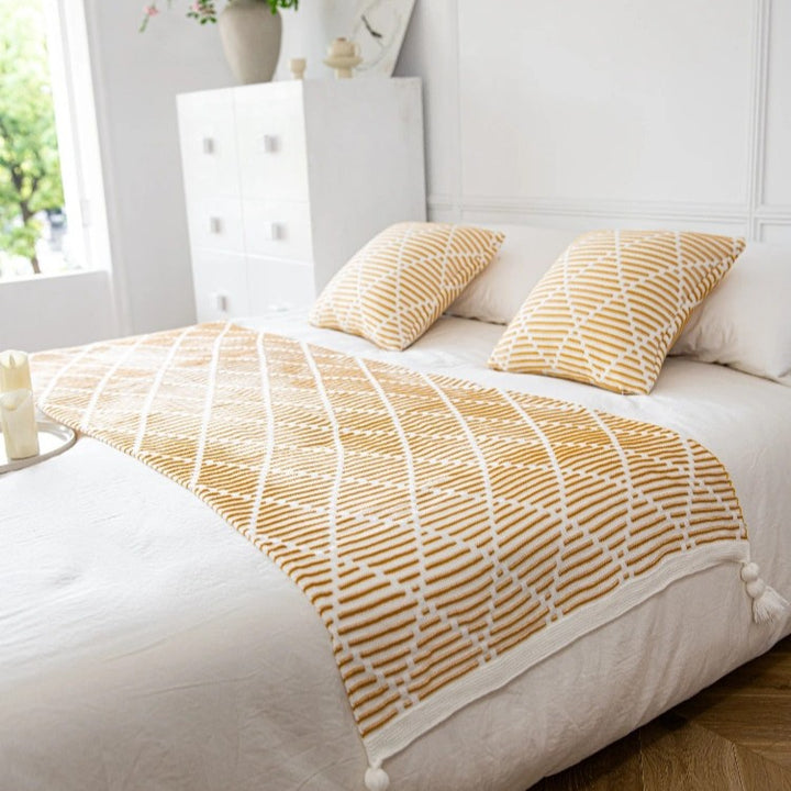 Dekorativer Strickwurfdecke