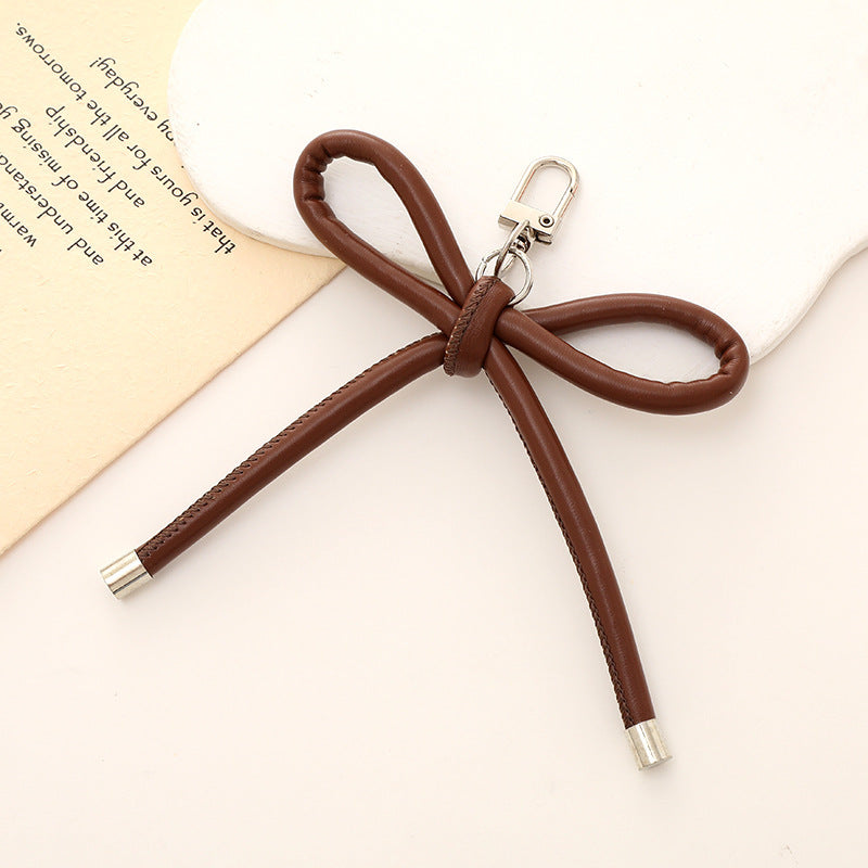 Stylischer Schleifen-Knoten Schlüsselanhänger Halter Karnz