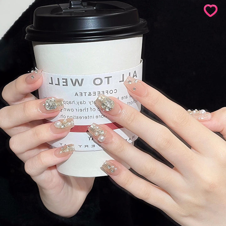 Kunstnagelset mit elegantem Perl- und Glitzerdesign Karnz