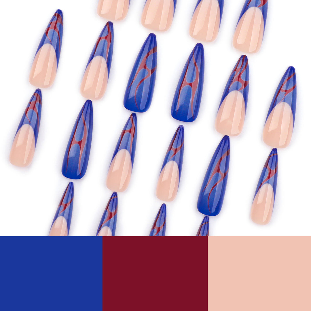 Kunstvolle Stiletto-Nägel mit farbenfrohen Designs und kreativen Akzenten Karnz