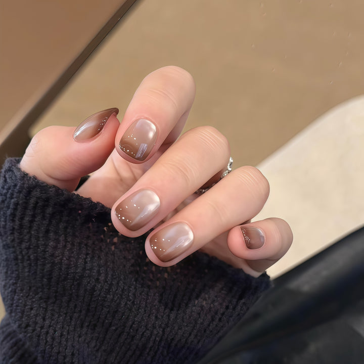 Kunstnägel mit Elegantem Farbverlauf und Glitzerelementen Karnz