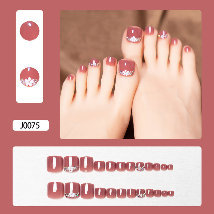 Glitzernde French Tip Zehennagelkunst