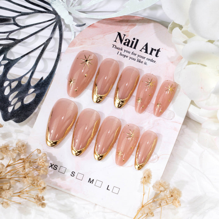 Chic Stiletto Press-On Nagelkunstset mit goldenen Sternakzenten Karnz