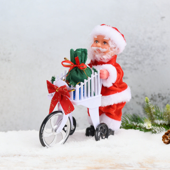 Dekorative Weihnachtsmannfigur mit Süßigkeit