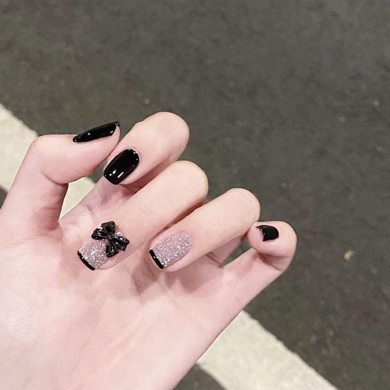 Elegante Stiletto Press-On Nail Set mit dekorativen Schleifenakzenten Karnz