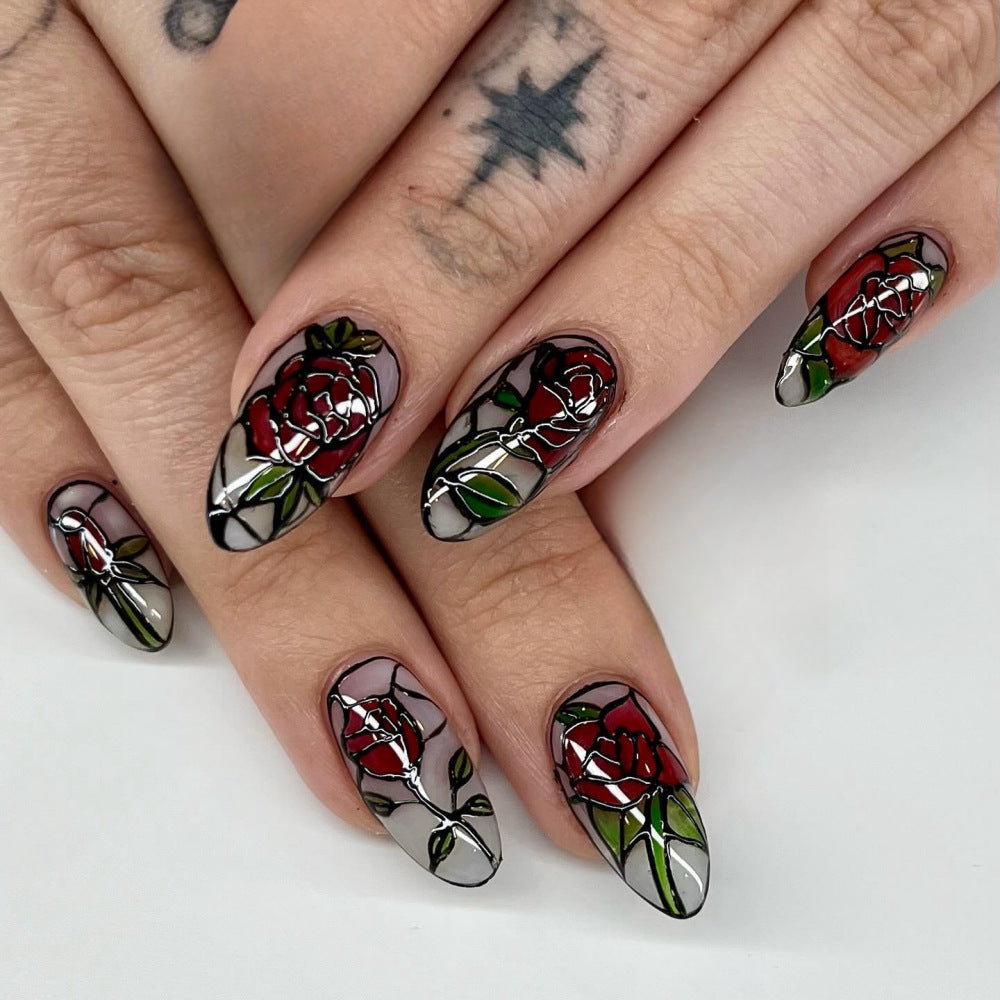 Elegant gestaltete Kunstnägel mit Blumenmuster Karnz