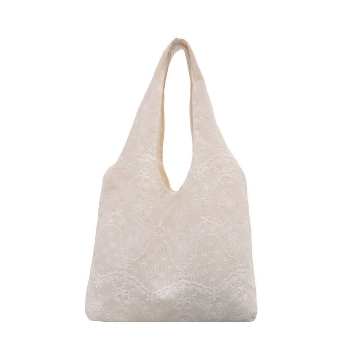 Elegante Schultertasche mit Spitzenbesatz Karnz