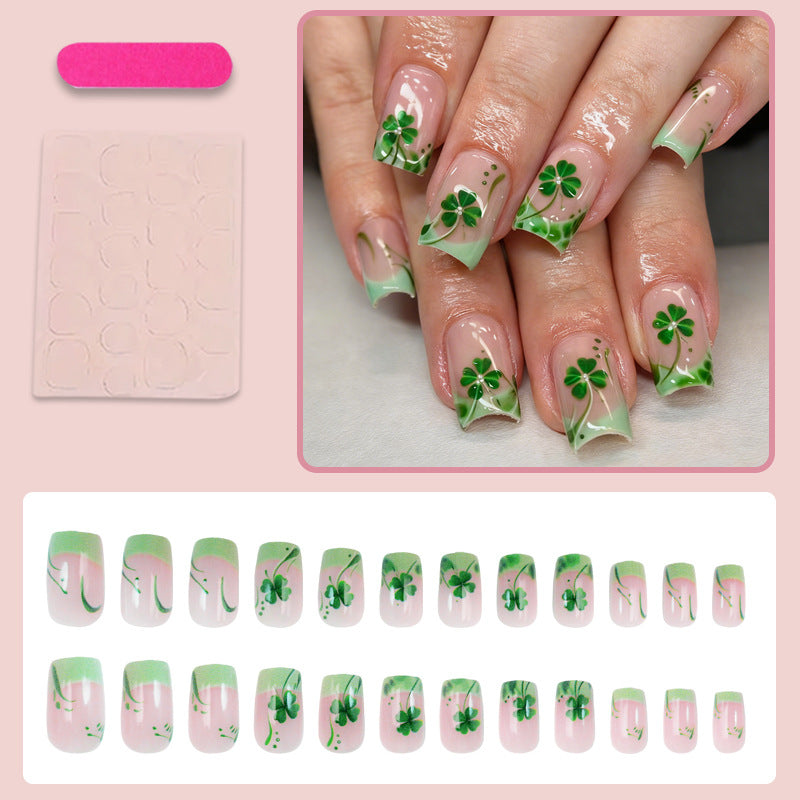 Kunstnagelset mit festlichen Glitzer- und Kleeblatt-Motiven Karnz