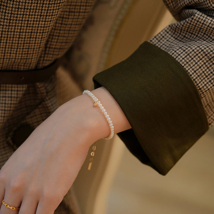 Perlenarmband mit Feinem Goldakzent Karnz