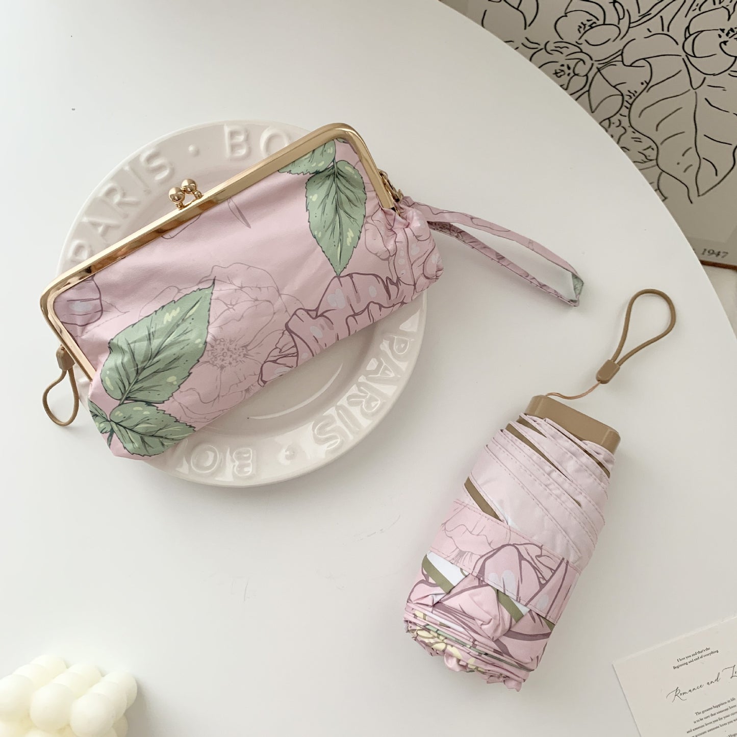 Damen eleganter Faltregenschirm mit floralem Design und praktischem Etui Karnz