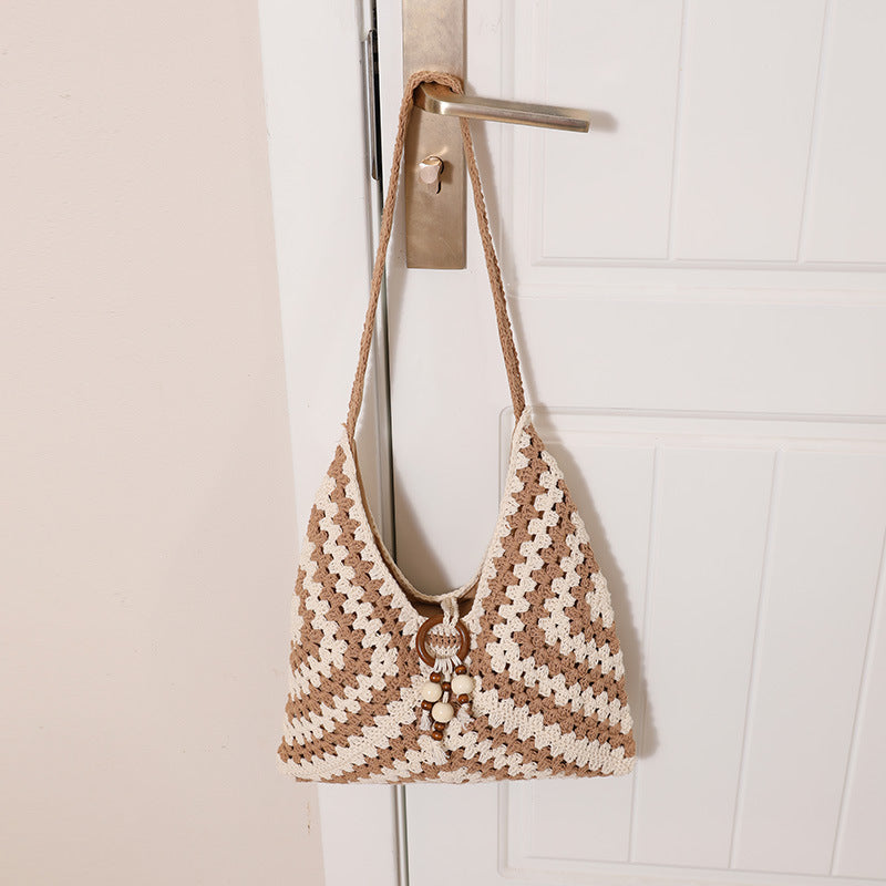 Damen Handtasche mit kunstvollem Flechtmuster Karnz