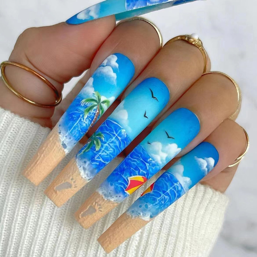 Künstlerische strandthematische Nagelkunst Karnz