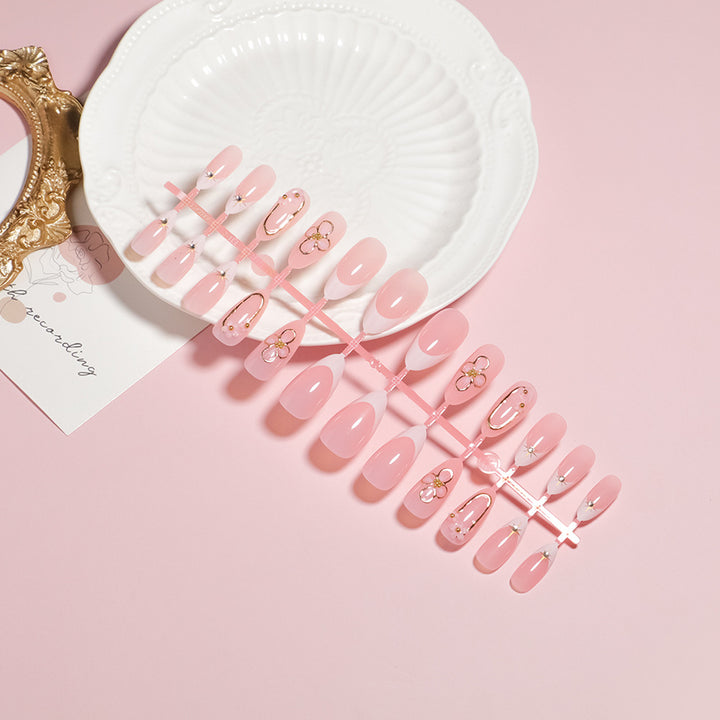 Elegantes florales Akzent Press-On Nagelset Karnz