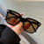 Damen quadratische Sonnenbrille mit eleganter Rahmenstruktur und UV-Schutz Karnz