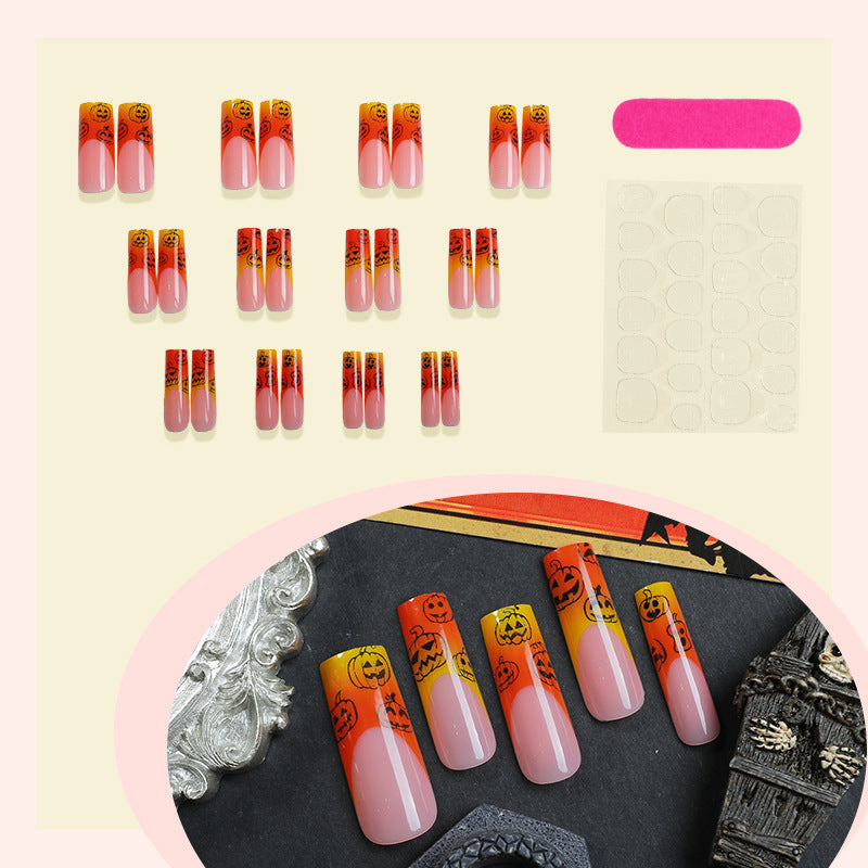 Kunstnagelset mit Halloween-Motiv und Glitzer Karnz