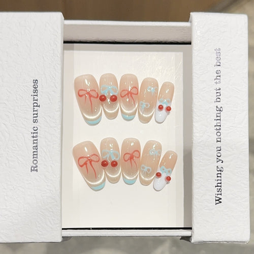 Künstliche Nagelspitzen mit Romantischen Schleifen- und Kirschenmotiven Karnz