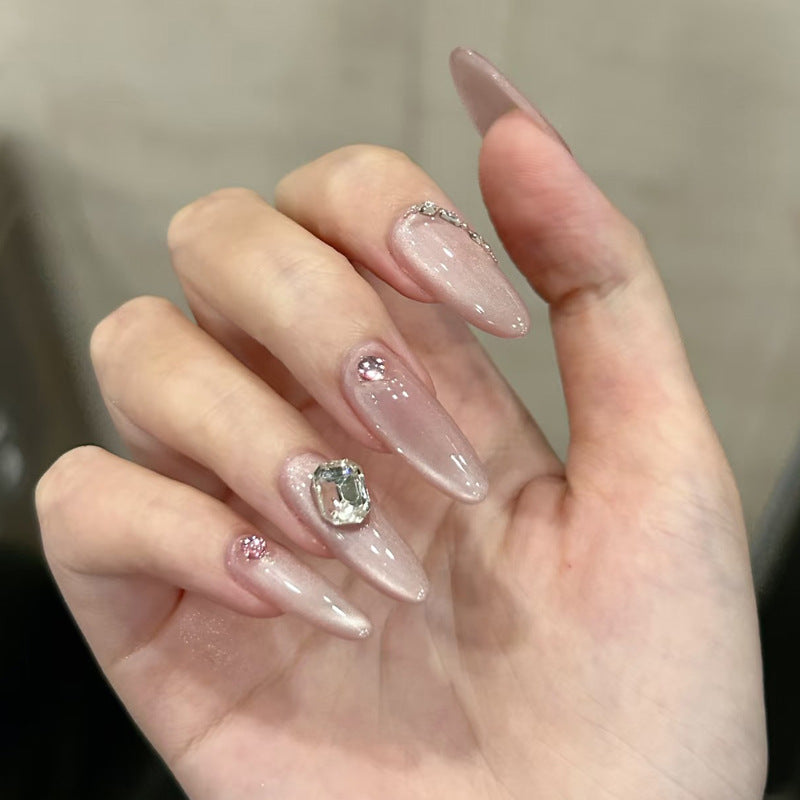 Elegantes Stiletto Press-On Nail Art Set mit glitzernden Akzenten Karnz