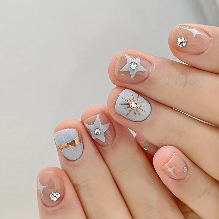 Künstlerisches Press-On-Nagelset mit glitzernden Sternakzenten Karnz