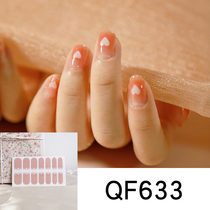Künstliche Nagelgestaltung mit Herz-Motiv Karnz