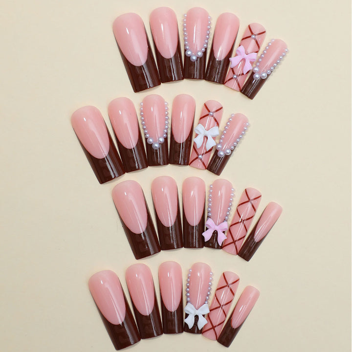Kunstnagelset mit stilvollen 3D-Bow-Details und elegantem Glanz Karnz