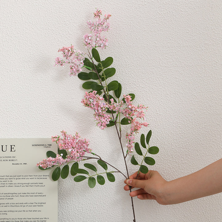 Künstlicher Blütenzweig mit lebendigen lila Blüten Karnz