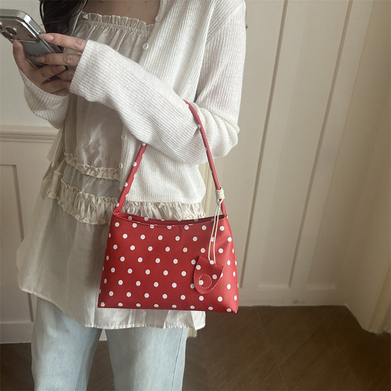 Lässige gepunktete Schulterhandtasche