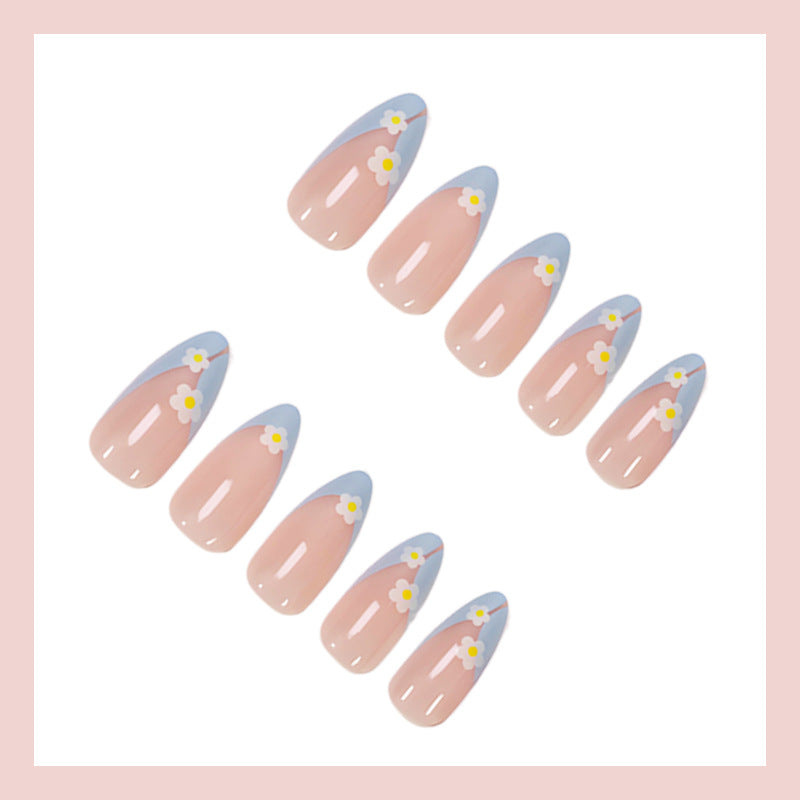 Kunstnagelset mit eleganten Blumen- und Pastellverzierungen Karnz
