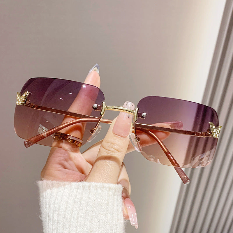 Damen Modische Sonnenbrille mit einzigartigem Rahmen und luxuriösen Akzenten Karnz