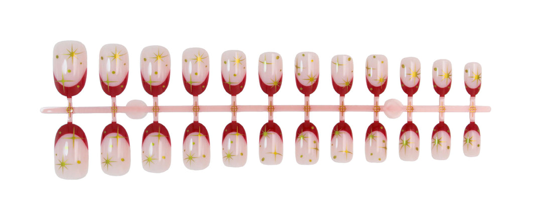 Kunstnagelset mit glamourösen Sternenmotiven und elegantem Farbverlauf Karnz