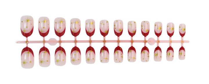 Kunstnagelset mit glamourösen Sternenmotiven und elegantem Farbverlauf Karnz