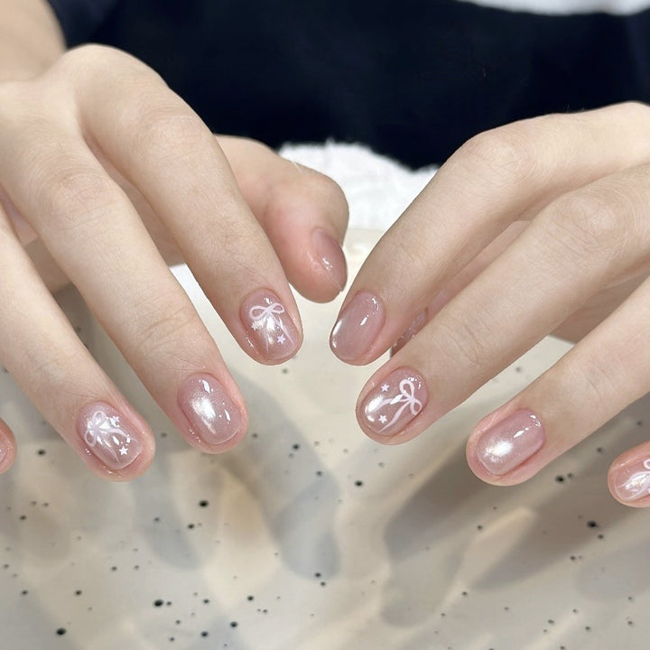Press-On Nail Art Set mit dekorativem Schleifendesign