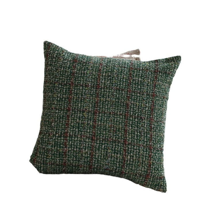 Quadratischer Bouclé-Kissenbezug im Tweedstil mit dezentem Multicolor‑Tufting Karnz