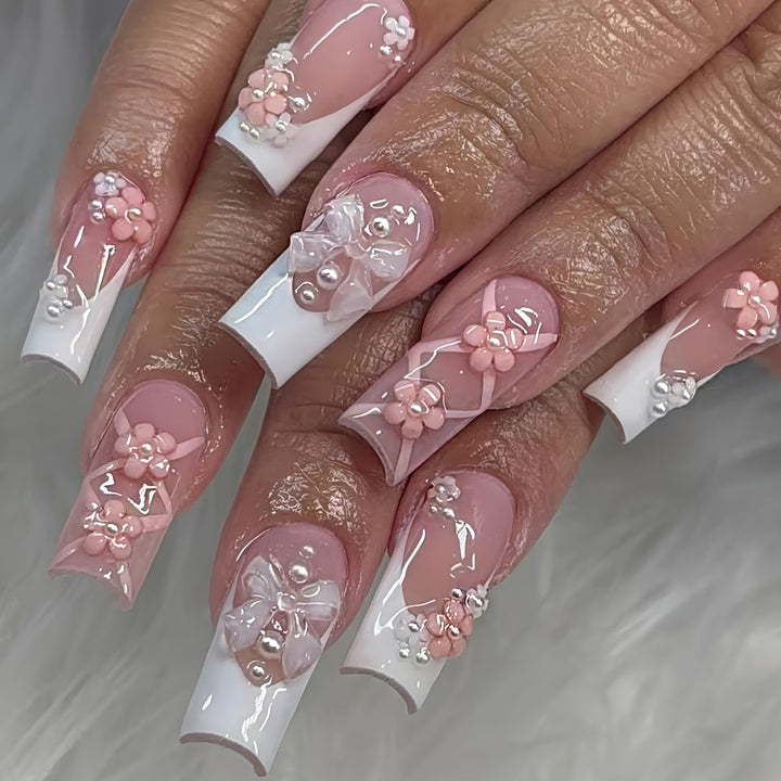 Kunstnagelset mit eleganten 3D-Blüten und Schleifenverzierungen Karnz