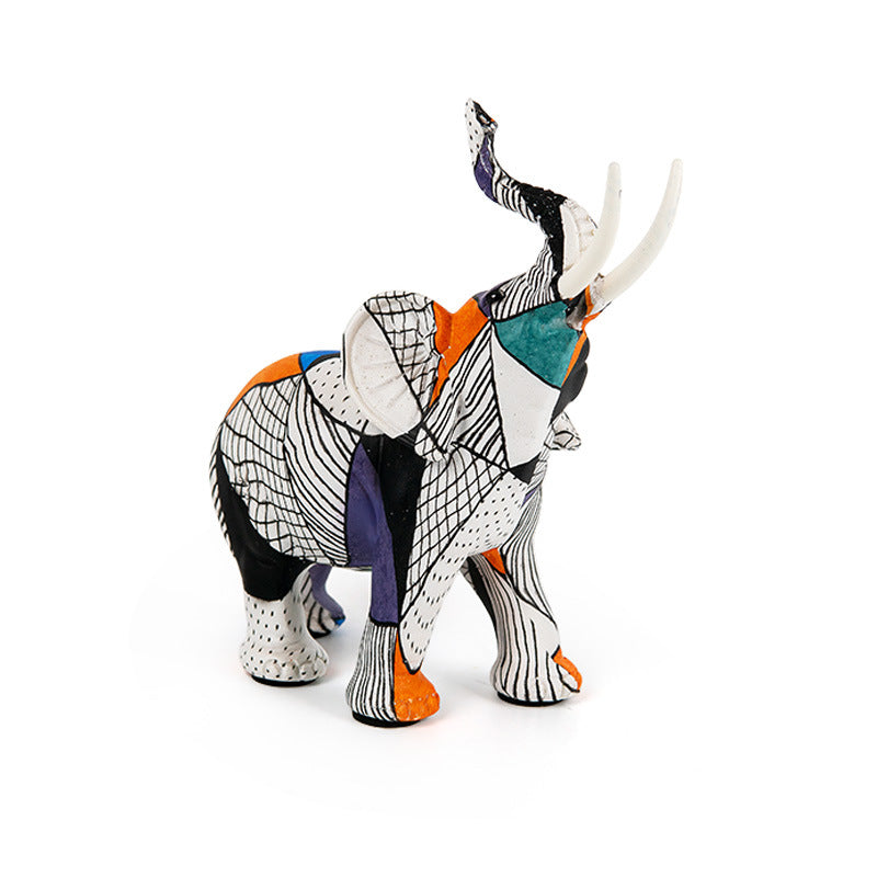 Kreative Elefantenfigur mit farbenfrohem Design Karnz