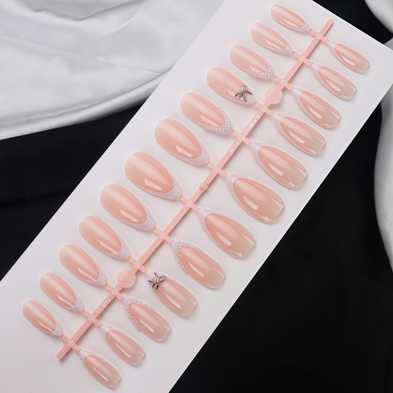 Elegantes Acryl Press-On Nagelset mit Perle und Schleifenakzenten Karnz