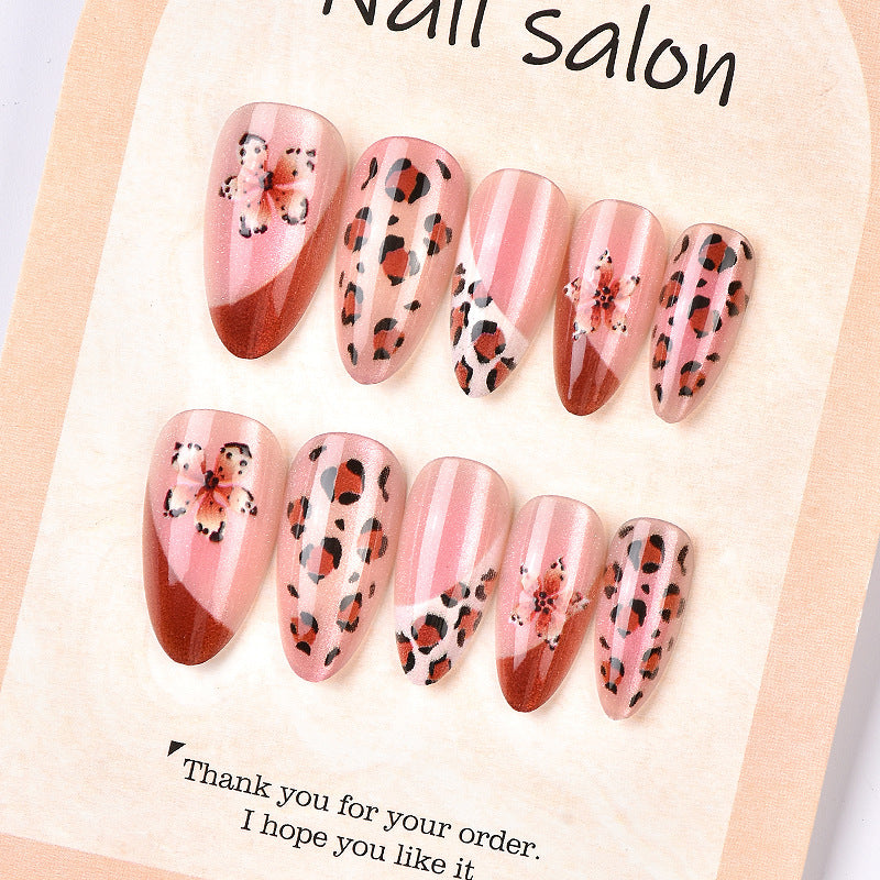 Künstlerisches Press-On Nagelkunstset mit floralen und Leoparden Designs