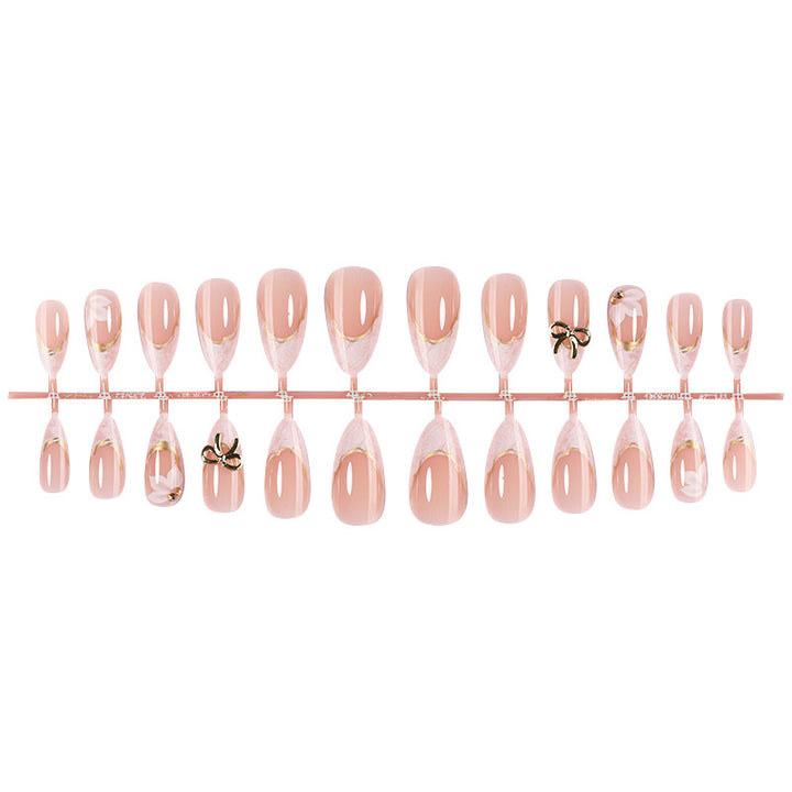 Elegantes Press-On Nail Art Set mit dekorativen Schleifenakzenten Karnz