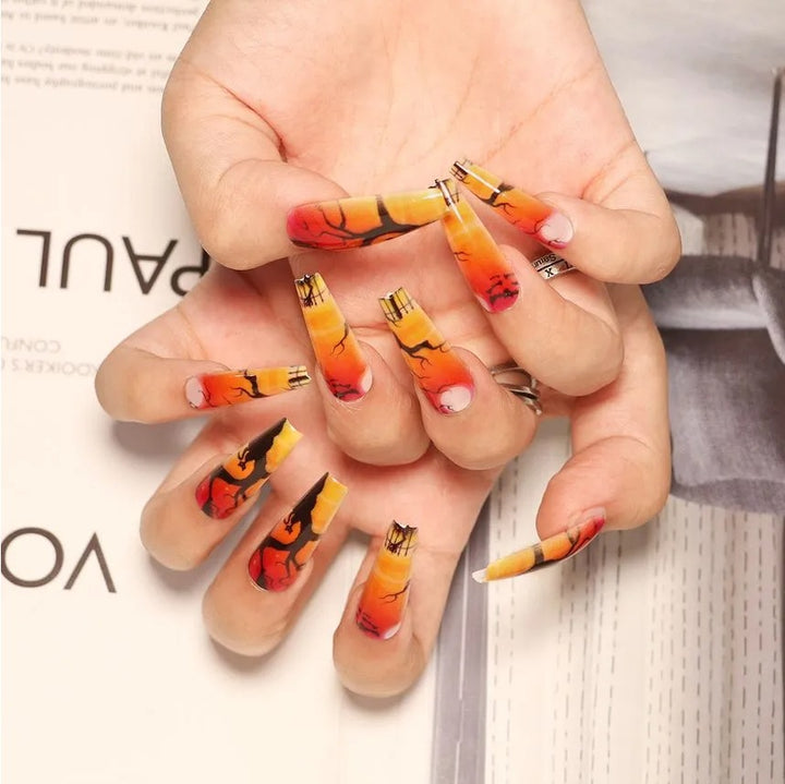 Künstlerisches Press-On Nageldesign mit Tropfeneffekt Karnz